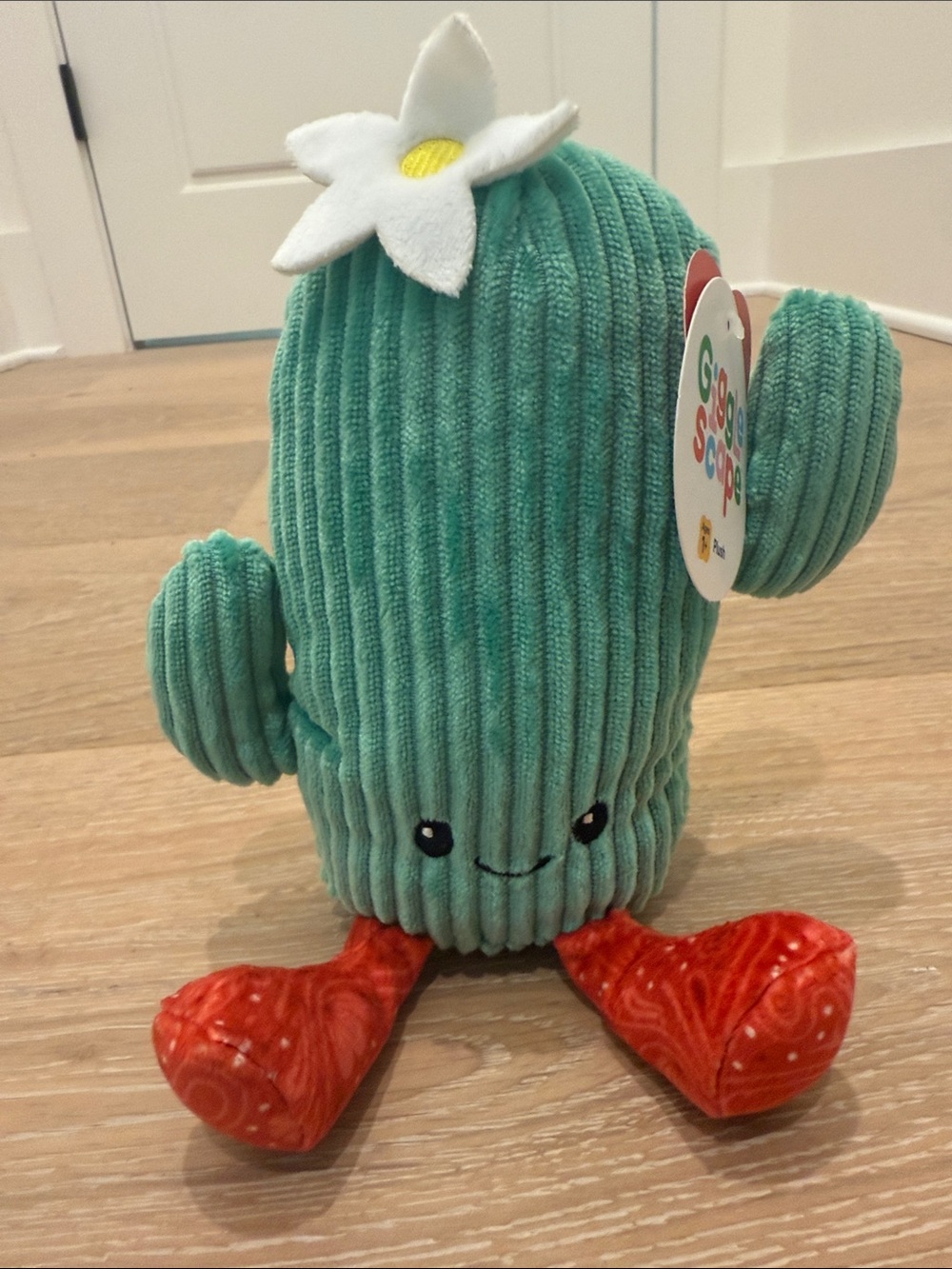 Gigglescape 8” Green Cactus with flower on head, adorable smile and red legs.